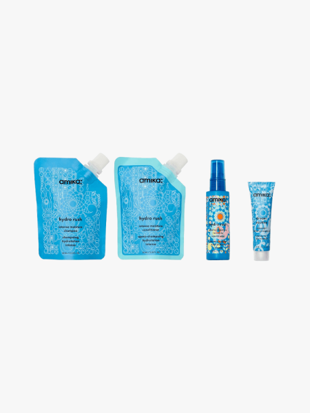 Amika Hydro Dream in multiple branded components on a light gray background